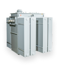 Large grey substation transformer with bushings and radiators
