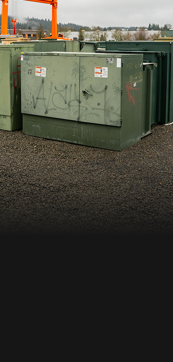Used surplus transformers in a Maddox yard
